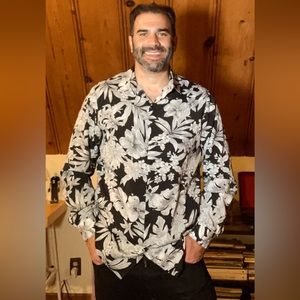 “Nova Men” black and white floral print button down shirt.
